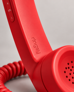 Close-up of subtle Ringsy engraving on red handset