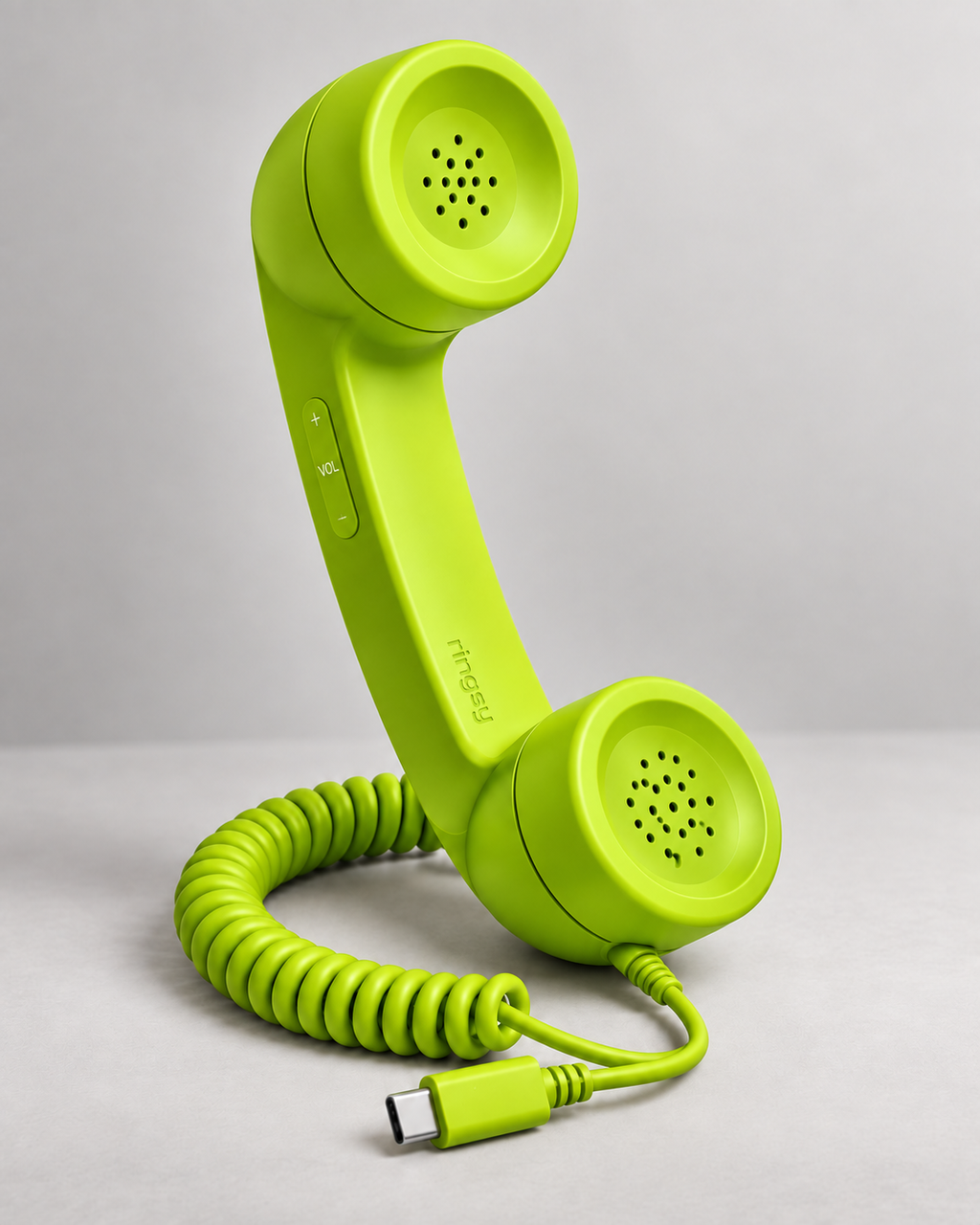 Neon green Ringsy retro handset with USB-C cable