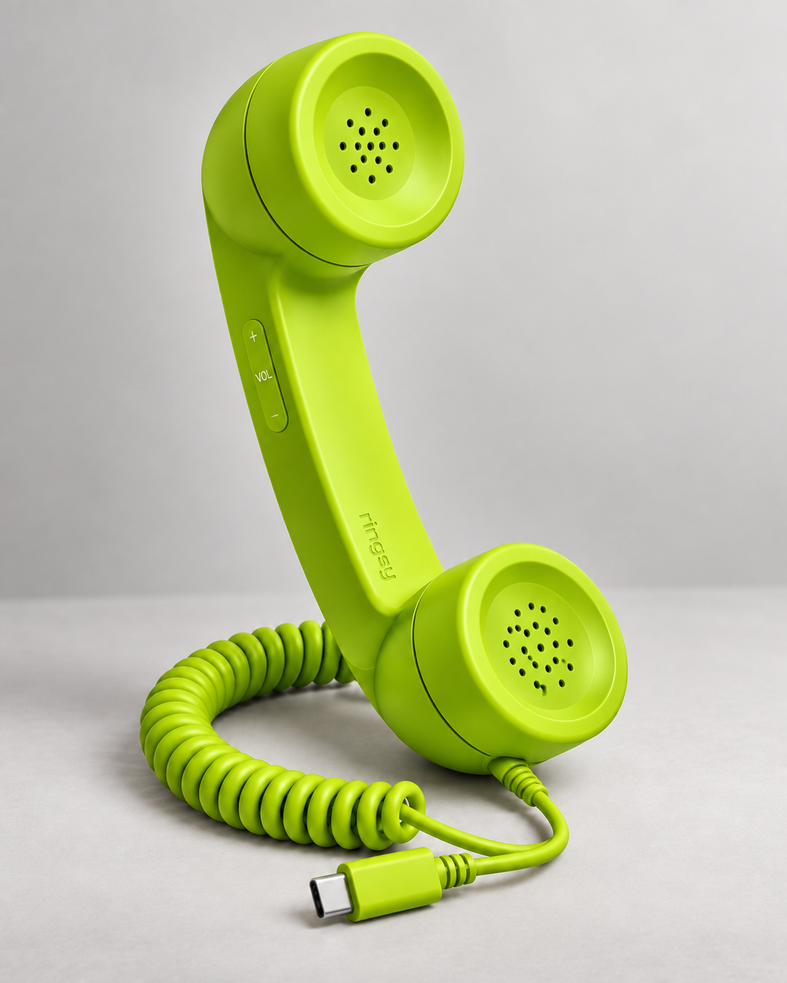 Neon green Ringsy retro handset with USB-C cable