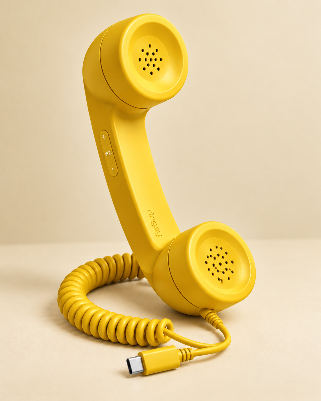 Yellow Ringsy retro handset with USB-C cable